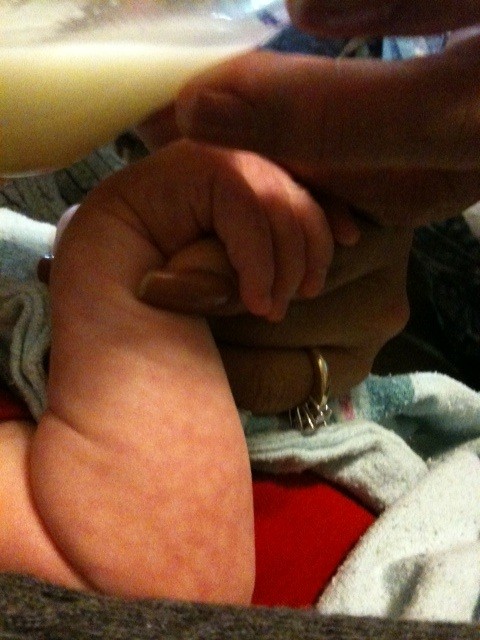 Holding Gmas finger while I eat.