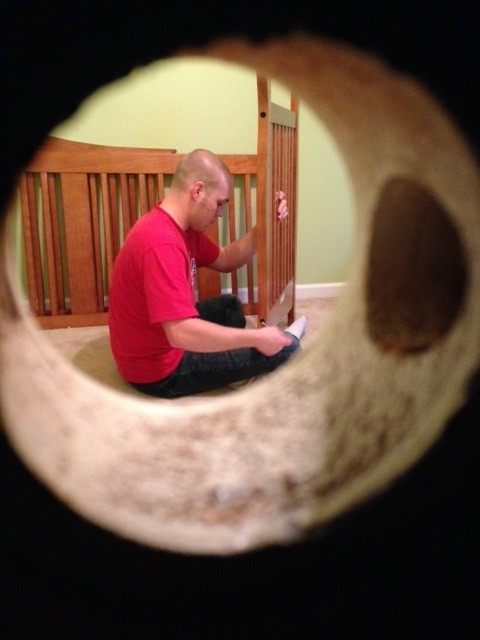 Putting the crib together 2